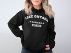 Black hoodie with "Lake Ontario Canada Est. 1615" graphic design.