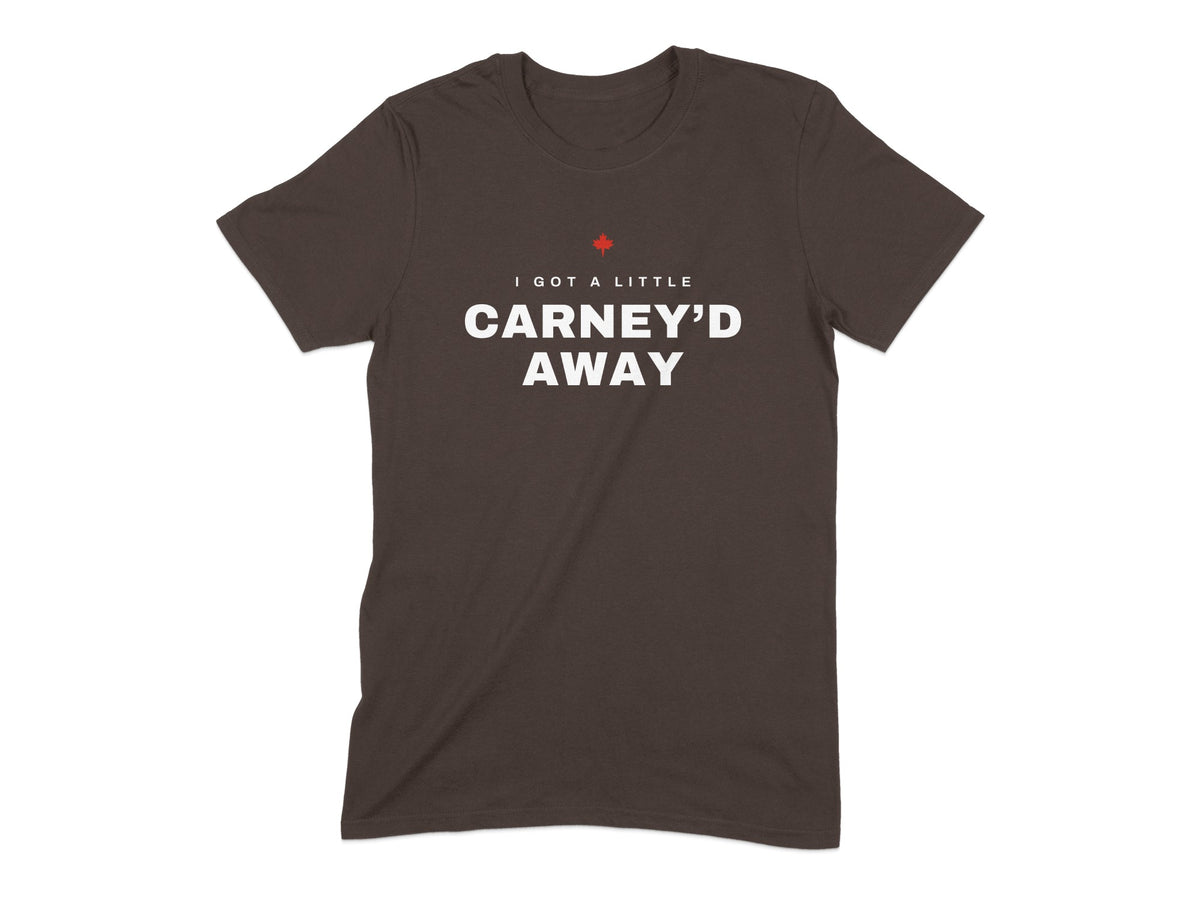 Brown t-shirt with red maple leaf and white text "I GOT A LITTLE CARNEY'D AWAY".