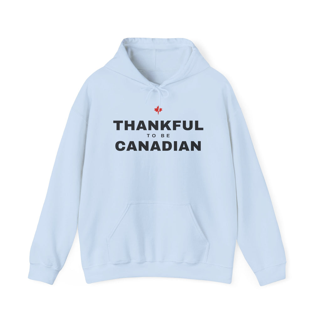 Light blue hoodie with "THANKFUL TO BE CANADIAN" text and a red maple leaf.