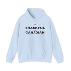 Light blue hoodie with "THANKFUL TO BE CANADIAN" text and a red maple leaf.