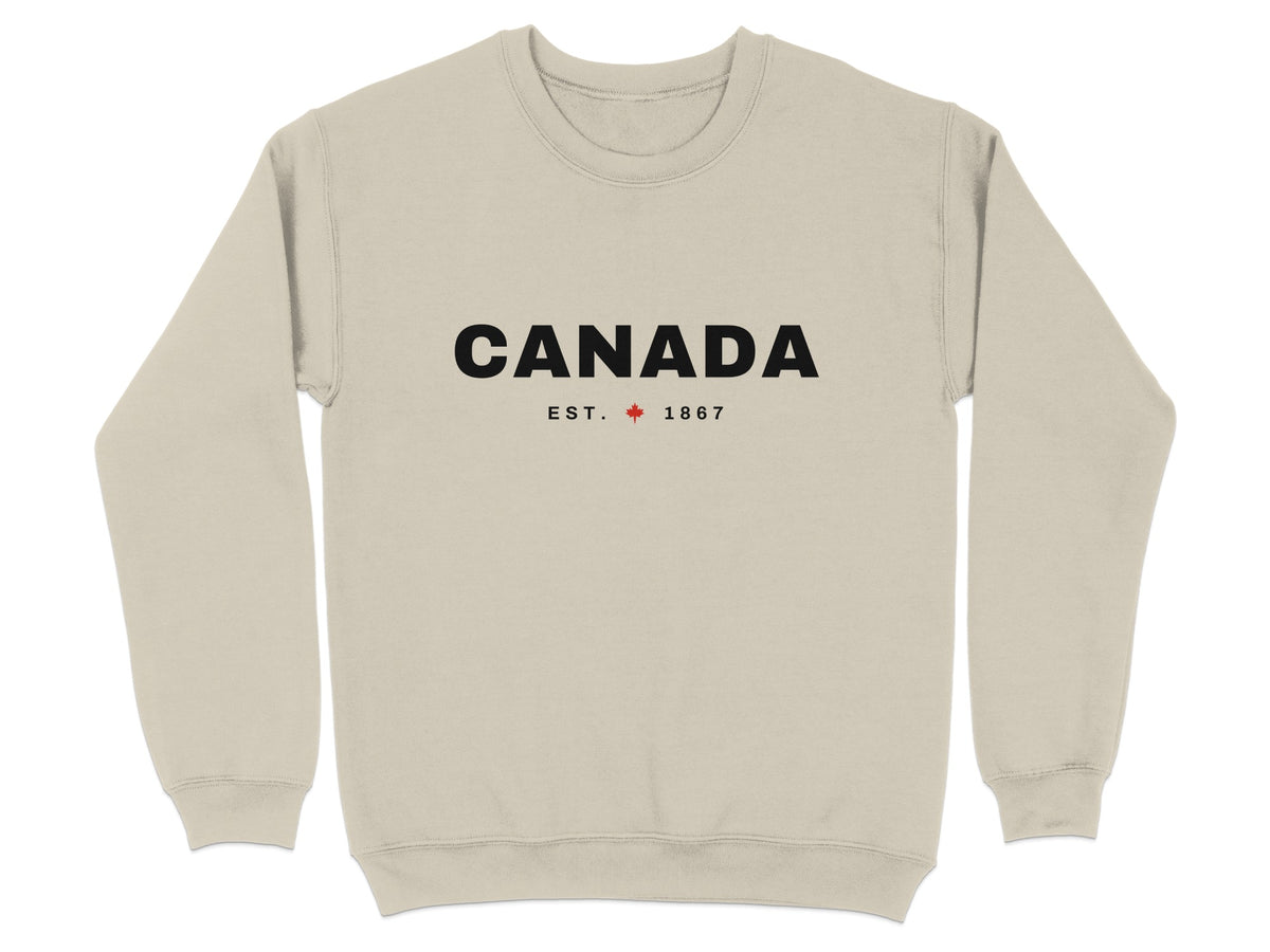 Cream sweatshirt with black "CANADA EST. 1867" text and maple leaf.
