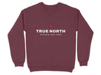 Maroon sweatshirt with "TRUE NORTH STRONG AND FREE" and a red maple leaf.