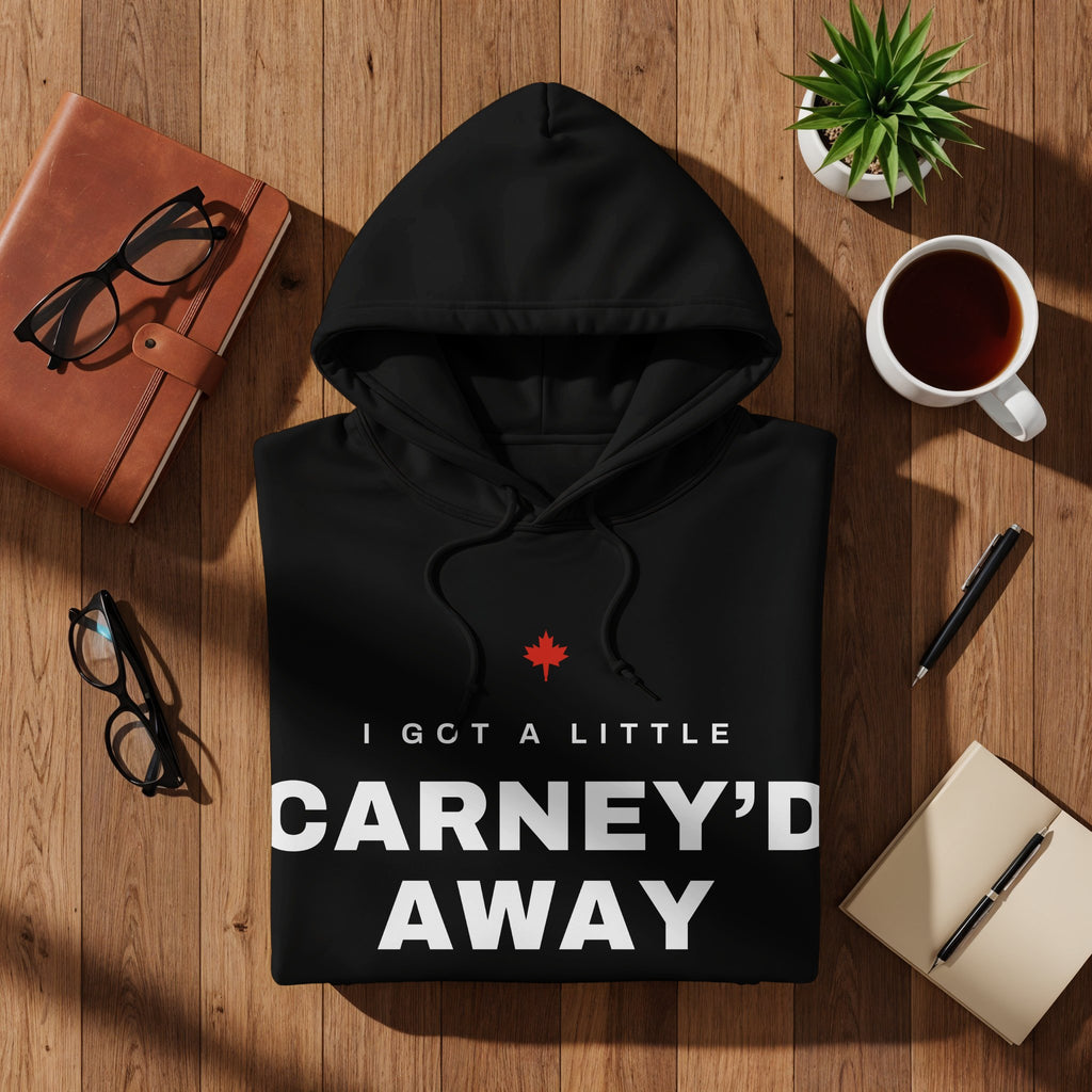 Black hoodie with "I GOT A LITTLE CARNEY'D AWAY" text and Canadian maple leaf graphic.