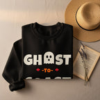 Black sweatshirt with "GHOST -TO-" text and a ghost graphic.