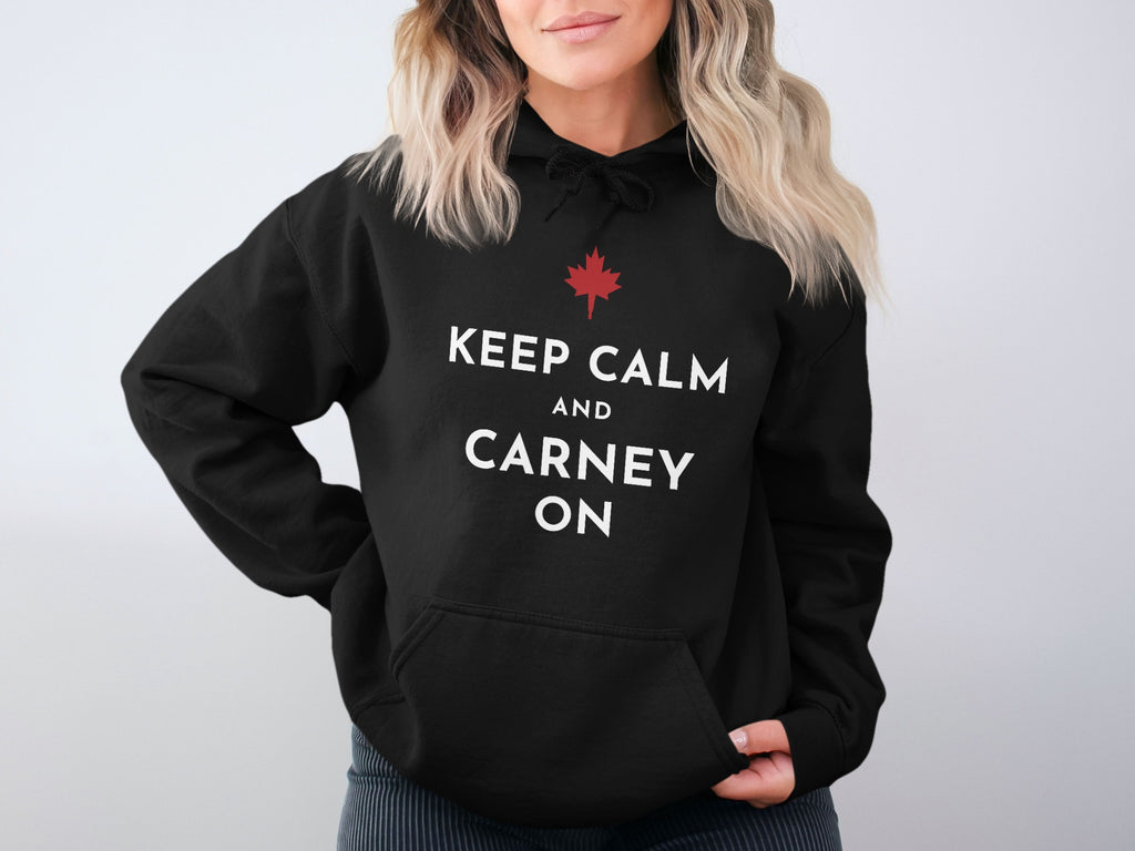 Black hoodie with white text "KEEP CALM AND CARNEY ON" and a red maple leaf.