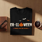 Black t-shirt with "EH-LLOWEEN" text, pumpkin, bats, and "Sorry for the Scare" slogan.