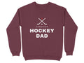Maroon sweatshirt with white "Canadian Hockey Dad" text and crossed hockey sticks graphic.