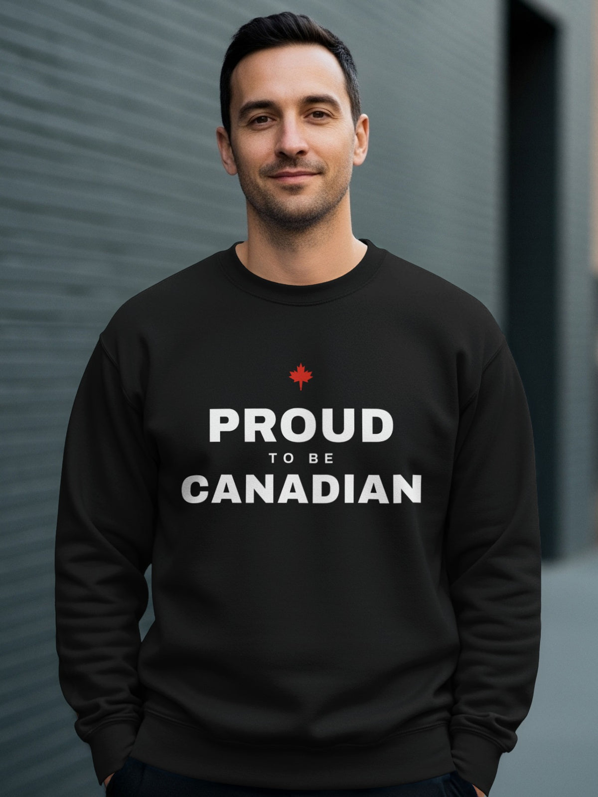 Man wearing a black sweatshirt with "Proud To Be Canadian" and a red maple leaf.
