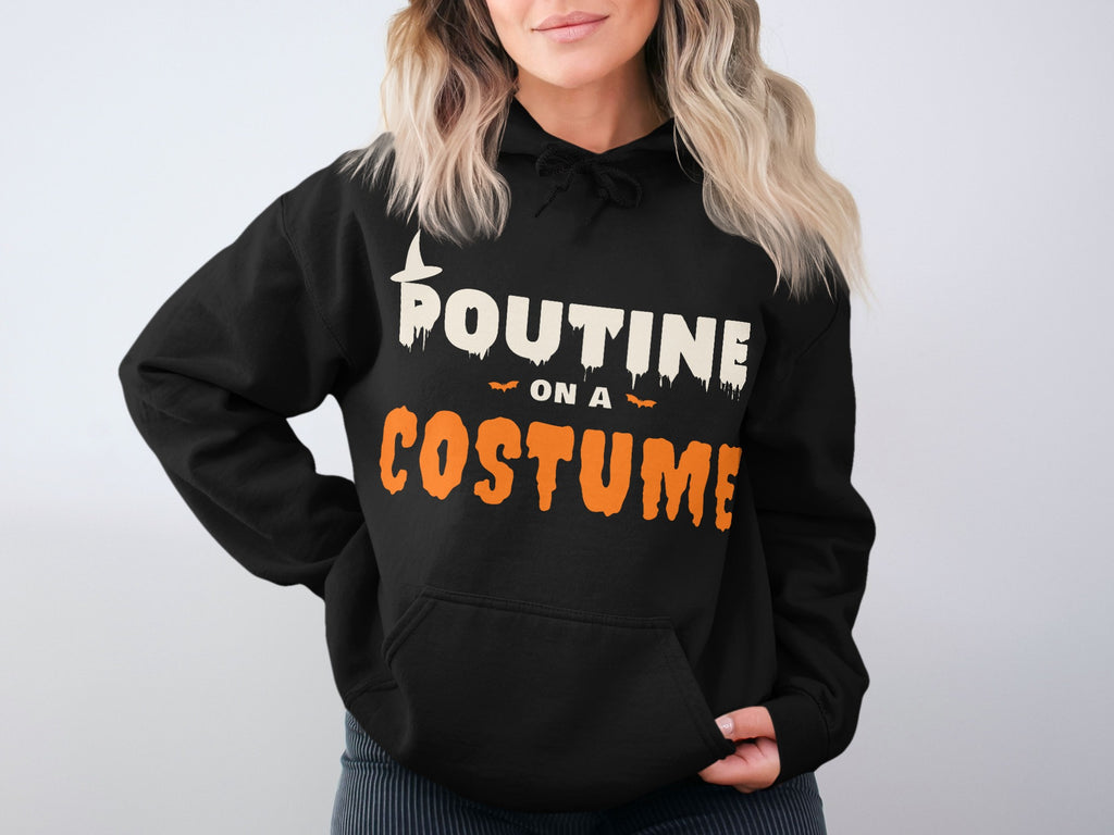 Black hoodie with text "POUTINE ON A COSTUME" in distressed white and orange font.