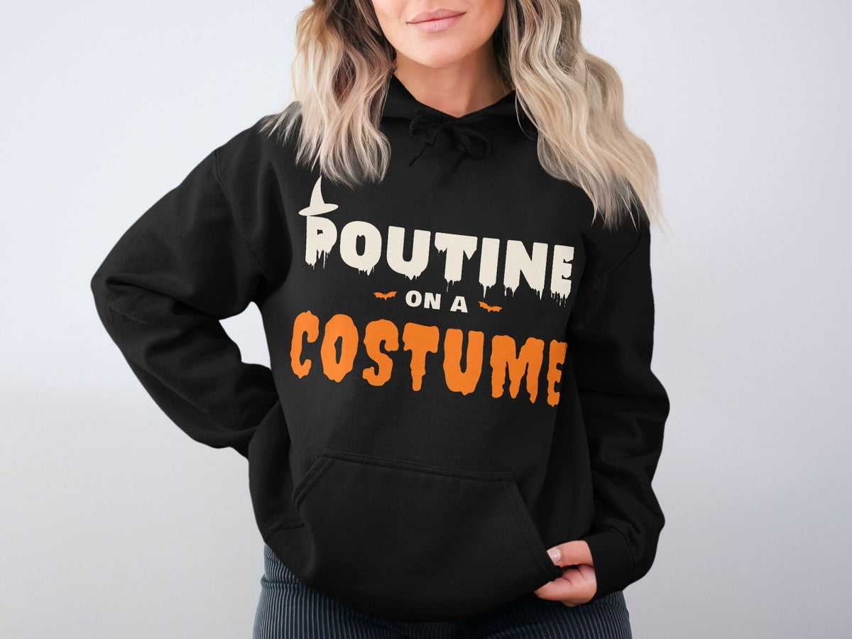 Black hoodie with text "POUTINE ON A COSTUME" in distressed white and orange font.