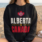 Black sweatshirt with "Alberta is Canada" text and Alberta's provincial flower.