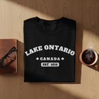 Black t-shirt with "Lake Ontario Canada Est. 1615" text and maple leaves.