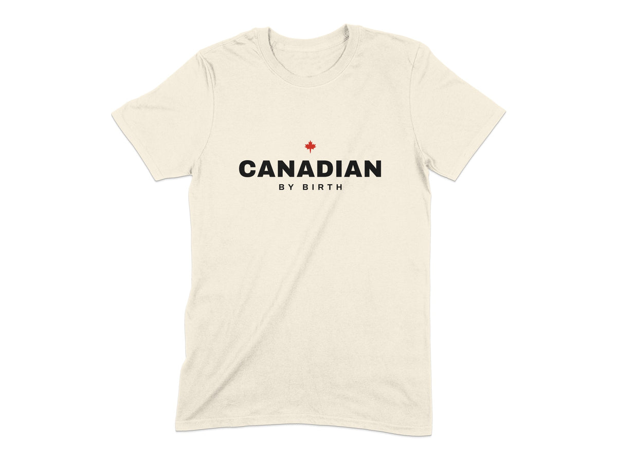 Cream t-shirt with "CANADIAN BY BIRTH" and a red maple leaf logo.