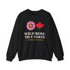 Black sweatshirt with pink flower, red maple leaf, and text.