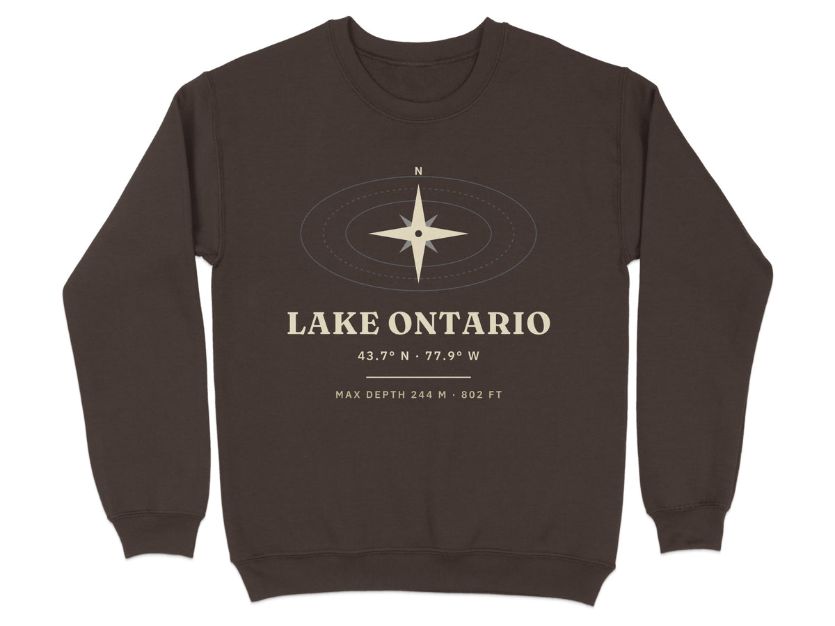Brown sweatshirt with Lake Ontario coordinates, compass, and depth information.