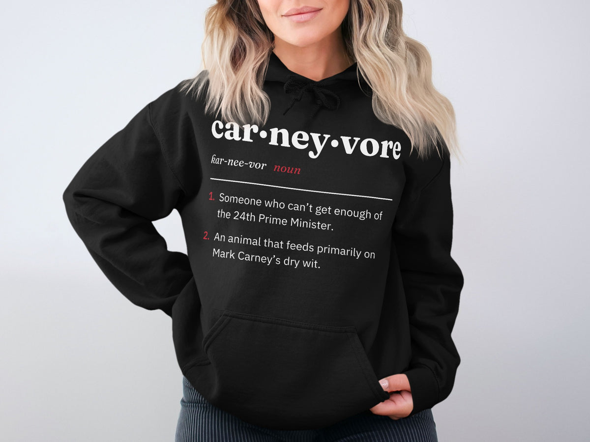 Black hoodie with "carneyvore" definition: noun, 1. Someone who can't get enough of the 24th Prime Minister. 2. An animal that feeds primarily on Mark Carney's dry wit.