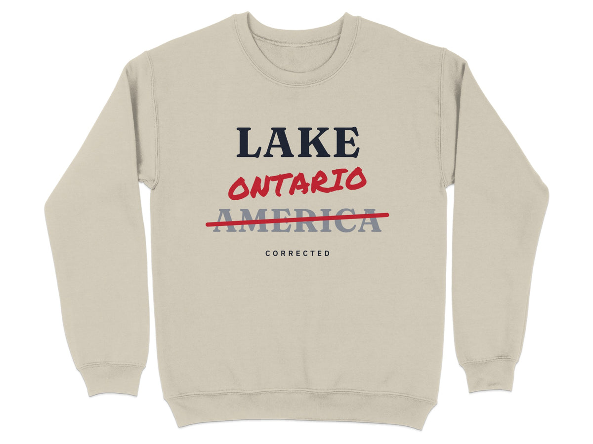 Beige sweatshirt with "LAKE ONTARIO" crossed out and "AMERICA CORRECTED" text.