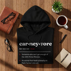 Black hoodie with "carneyvore" definition including "24th Prime Minister" and "Mark Carney".