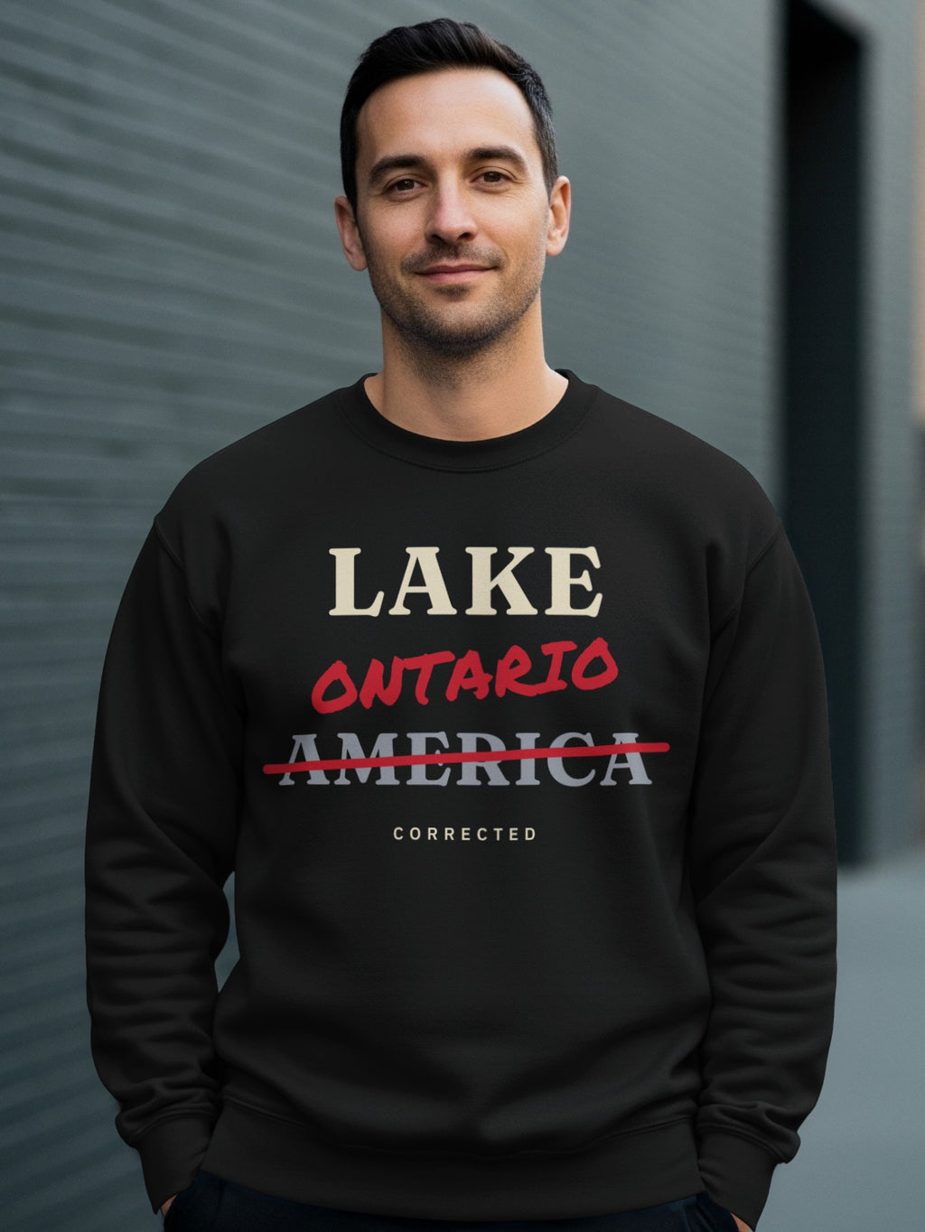 Black sweatshirt with "LAKE ONTARIO AMERICA CORRECTED" text.