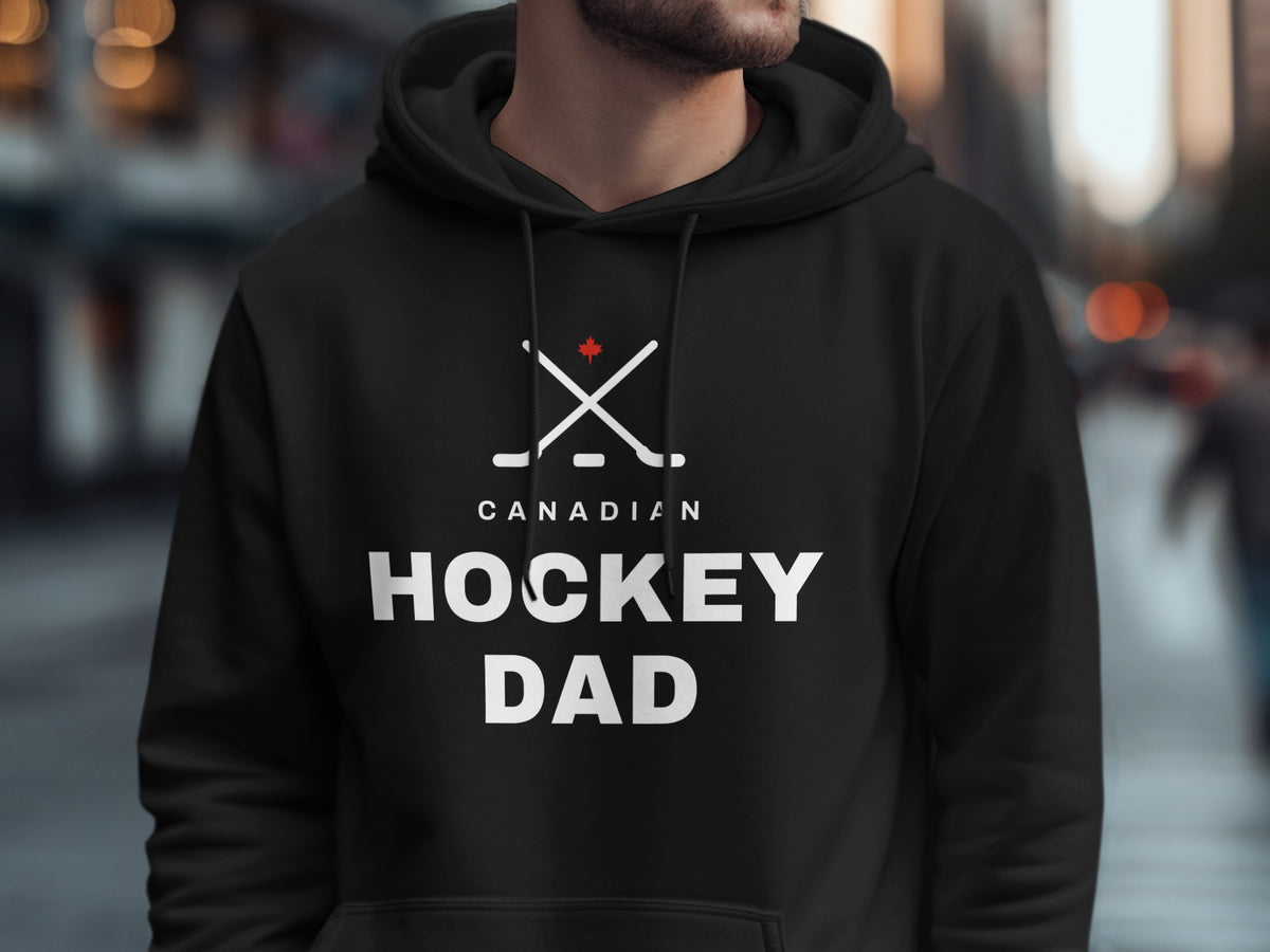 Black hoodie with "Canadian Hockey Dad" text and hockey stick graphic.