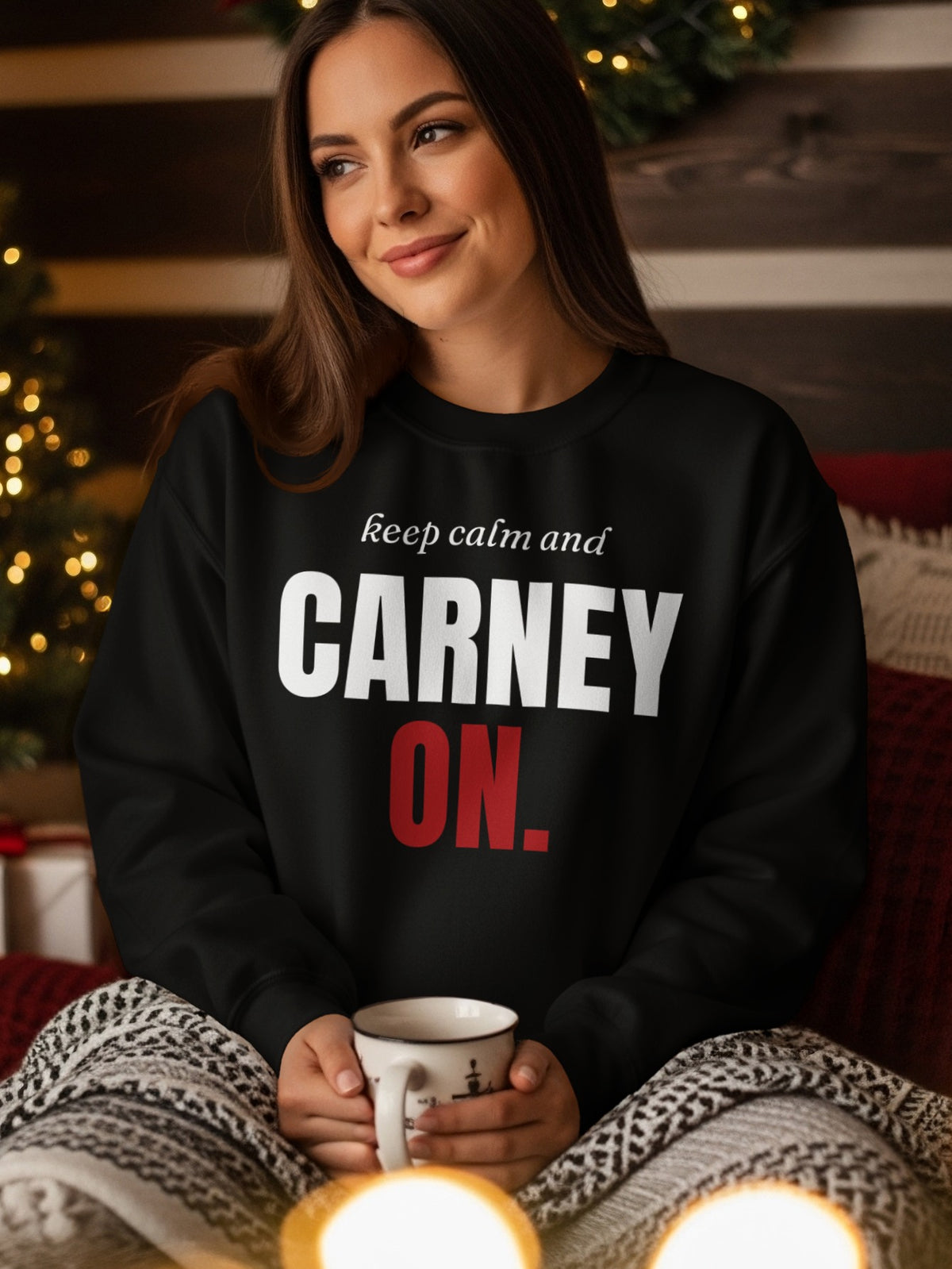 Black sweatshirt with white text "CARNEY ON." and smaller white text above.
