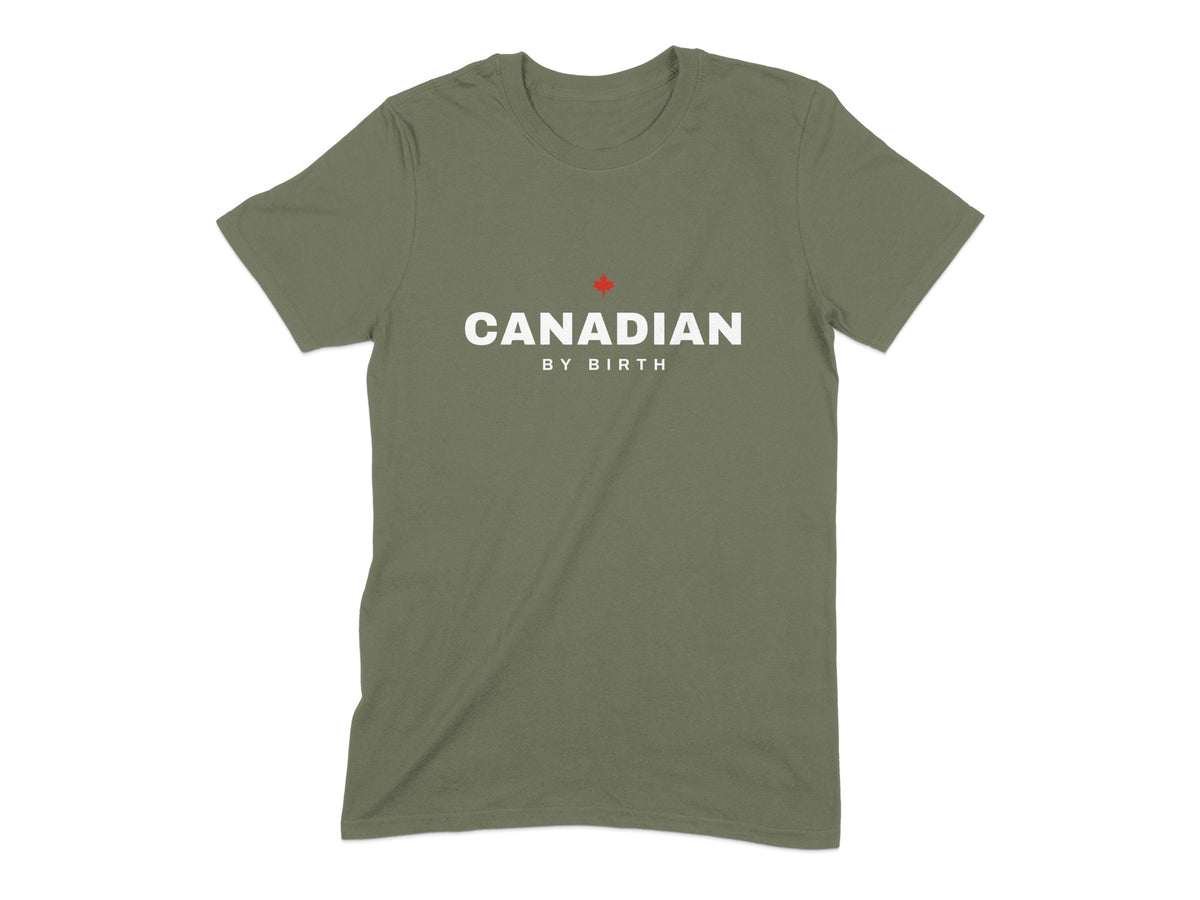 Green t-shirt with white text "CANADIAN BY BIRTH" and a red maple leaf.