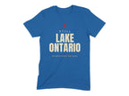 Blue t-shirt with "Still Lake Ontario on Maps Since the 1600s" text and red maple leaf.
