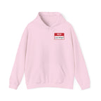 Pink hoodie with a red name tag that says "HELLO LAKE ONTARIO (STILL)".