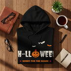 Black hoodie with Halloween pumpkin graphic and "Sorry for the scare" text.