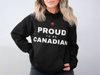 Black hoodie with white text "PROUD TO BE CANADIAN" and a red maple leaf.