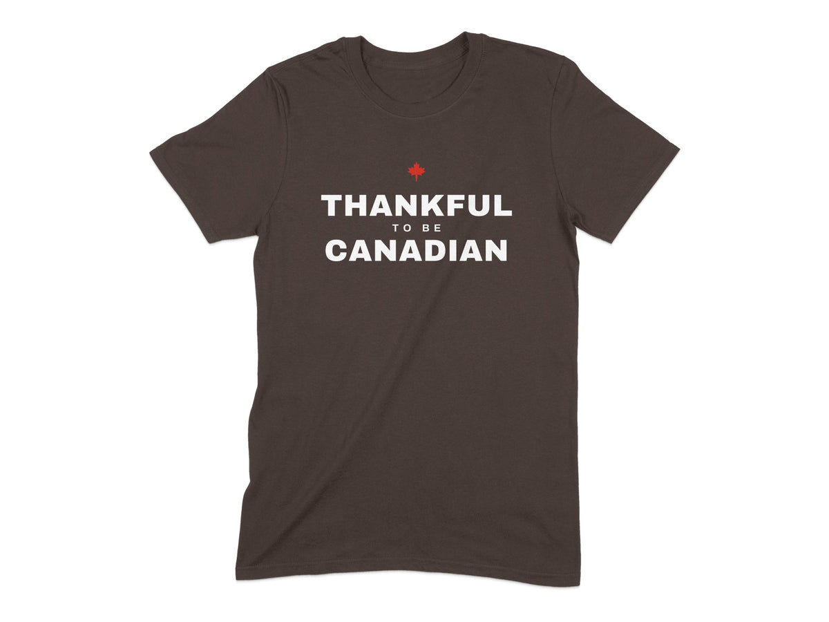 Dark brown t-shirt with white text "Thankful To Be Canadian" and red maple leaf.