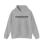 Grey hoodie with "CANADIAN BY CHOICE" and a maple leaf graphic.