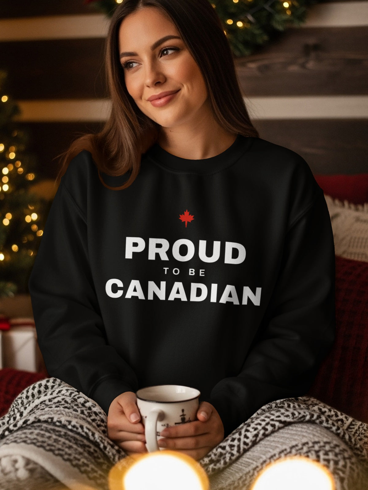 Black sweatshirt with "Proud To Be Canadian" and a red maple leaf.