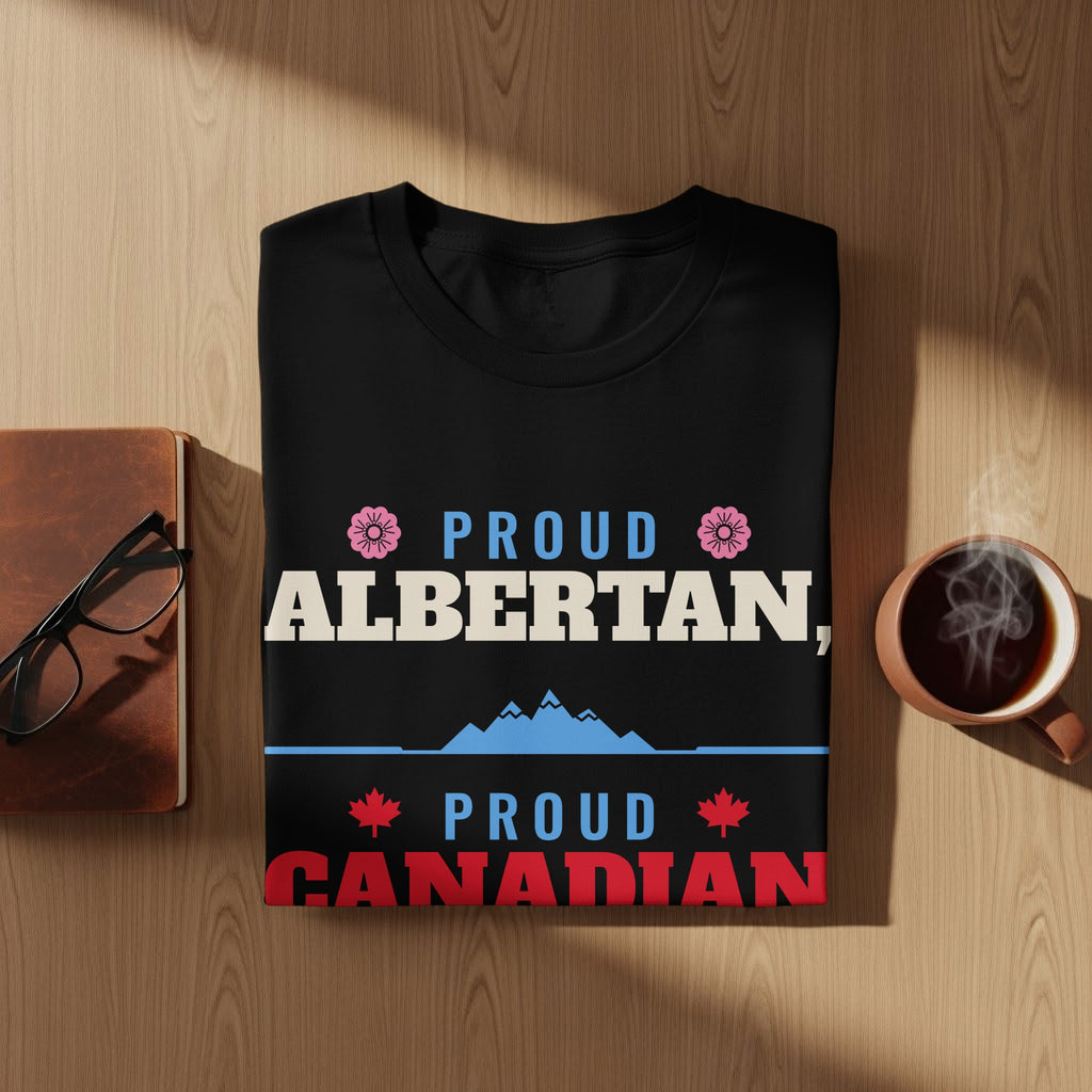 Black t-shirt with "Proud Albertan" and "Proud Canadian" text, mountains, and maple leaves.
